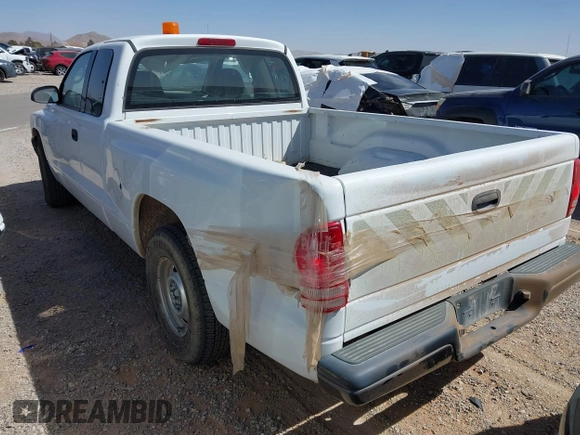2002 Dodge Dakota with VIN 1B7GL12X32S701273, listed as a IAAI auction lot 41552573 with 157,212 mi miles and . Bid and sale history available at carsss.com. Image 3.