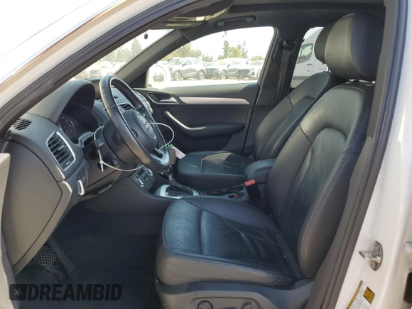 2015 Audi Q3 Premium Plus with VIN WA1BFCFS0FR001987, listed as a Copart auction lot 72962684 with 104,432 mi miles and Salvage title. Bid and sale history available at DreamBid. Image 7.