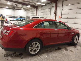 2014 Ford Taurus SEL z VIN 1FAHP2E83EG137639, wystawiony jako IAAI lot #41535259 z przebiegiem 62 978 mil mil oraz . Historia ofert i sprzedaży dostępna na DreamBid. Obrazek 13.