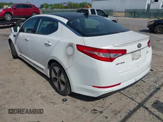 2012 Kia Optima Hybrid with VIN KNAGM4AD9C5033272, listed as a IAAI auction lot 42014808 with 173,740 mi miles. Bid and sale history available at carsss.com. Image 3.