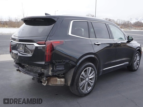 2021 Cadillac XT6 Premium Luxury z VIN 1GYKPDRS3MZ113033, wystawiony jako Copart lot #50076845 z przebiegiem 104 248 mil mil oraz Szkody całkowita. Historia ofert i sprzedaży dostępna na DreamBid. Obrazek 3.