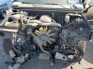 2004 Hummer H2 with VIN 5GRGN23U24H104327, listed as a Copart auction lot 74150914 with 181,933 mi miles and Salvage Title. Bid and sale history available at carsss.com. Image 12.