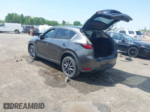 2018 Mazda CX-5 Touring with VIN JM3KFACM9J1348054, listed as a IAAI auction lot 42043458 with 120,177 mi miles. Bid and sale history available at carsss.com. Image 3.