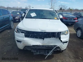 2021 Jeep Grand Cherokee Laredo X with VIN 1C4RJEAG2MC605574, listed as a IAAI auction lot 41642362 with 104,066 mi miles. Bid and sale history available at carsss.com. Image 13.