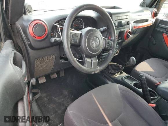 2013 Jeep Wrangler Sport z VIN 1C4AJWAG5DL671491, wystawiony jako Copart lot #59306745 z przebiegiem 111 778 mil mil oraz Szkoda całkowita • Salvage title. Historia ofert i sprzedaży dostępna na DreamBid. Obrazek 8.