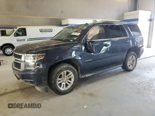 2020 Chevrolet Tahoe LS z VIN 1GNSCAKC1LR211101, wystawiony jako Copart lot #59407755 z przebiegiem 81 939 mil mil oraz Szkoda całkowita • Salvage title. Historia ofert i sprzedaży dostępna na DreamBid. Obrazek 1.