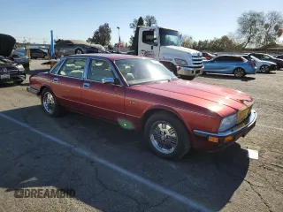 1994 Jaguar XJ with VIN SAJKX1747RC690894, listed as a Copart auction lot 88499345 with 24,006 mi miles and Clean Title. Bid and sale history available at DreamBid. Image 4.