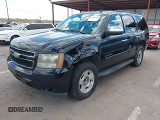 2007 Chevrolet Tahoe LS with VIN 1GNFC13C47J406467, listed as a IAAI auction lot 42081860 with 275,814 mi miles and . Bid and sale history available at DreamBid. Image 2.
