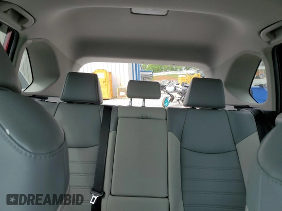 2022 Toyota RAV4 Hybrid XLE Premium with VIN 4T3B6RFV5NU074838, listed as a Copart auction lot 56697215 with 61,309 mi miles and Salvage title. Bid and sale history available at DreamBid. Image 10.