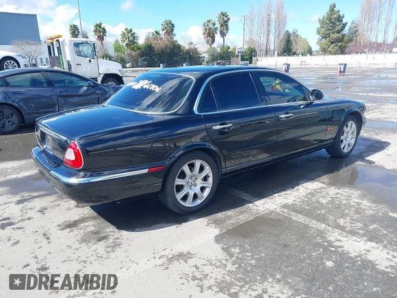 2004 Jaguar XJ with VIN SAJEA74C94SG11224, listed as a IAAI auction lot 41732975 with 204,815 mi miles and . Bid and sale history available at DreamBid. Image 4.