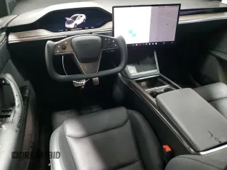 2023 Tesla Model X with VIN 7SAXCDE5XPF381338, listed as a Copart auction lot 51638855 with 1,570 mi miles and Clean Title. Bid and sale history available at carsss.com. Image 8.