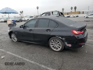 2023 BMW 3 Series 330e with VIN 3MW39FF01P8D05937, listed as a Copart auction lot 44490215 with 40,324 mi miles and Salvage Title. Bid and sale history available at carsss.com. Image 2.