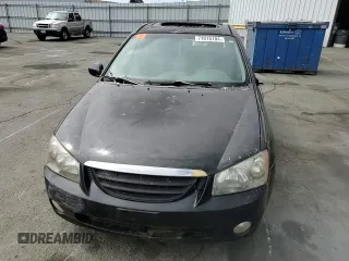 2005 Kia Spectra with VIN KNAFE162655074198, listed as a Copart auction lot 71015104 with 200,819 mi miles and Salvage Title. Bid and sale history available at DreamBid. Image 11.