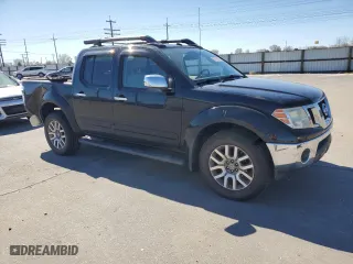 2011 Nissan Frontier PRO-4X with VIN 1N6AD0EV3BC437910, listed as a Copart auction lot 50757705 with 130,477 mi miles and Salvage Title. Bid and sale history available at carsss.com. Image 4.