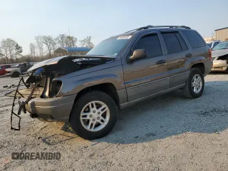 2000 Jeep Grand Cherokee Laredo с VIN 1J4G248S0YC329128, выставлен на аукционе Copart как лот 50899085 с пробегом Не указан миль и Списание • Salvage title. История ставок и продаж доступна на DreamBid. Изображение 1.