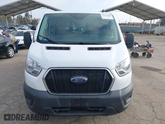 2021 Ford Transit Cargo with VIN 1FTBR1Y85MKA69355, listed as a IAAI auction lot 42544780 with 33,288 mi miles and . Bid and sale history available at DreamBid. Image 12.