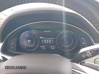 2018 Audi Q7 Premium Plus z VIN WA1LHAF79JD004553, wystawiony jako IAAI lot #42591653 z przebiegiem 65 349 mil mil oraz . Historia ofert i sprzedaży dostępna na DreamBid. Obrazek 7.