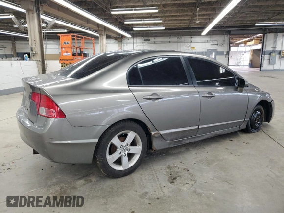 2006 Honda Civic LX with VIN 1HGFA16516L051998, listed as a Copart auction lot 47038345 with 166,496 mi miles and Salvage Title. Bid and sale history available at DreamBid. Image 3.