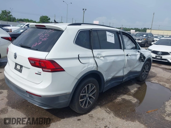 2018 Volkswagen Tiguan SEL with VIN 3VV2B7AX3JM199908, listed as a IAAI auction lot 42498185 with 58,540 mi miles and . Bid and sale history available at DreamBid. Image 4.