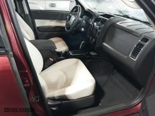 2010 Mercury Mariner Premier with VIN 4M2CN8HG9AKJ01231, listed as a IAAI auction lot 41868769 with 99,322 mi miles. Bid and sale history available at carsss.com. Image 5.