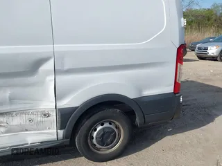 2016 Ford Transit Cargo with VIN 1FTYE1YM8GKA55568, listed as a IAAI auction lot 42055170 with 171,065 mi miles and . Bid and sale history available at DreamBid. Image 18.