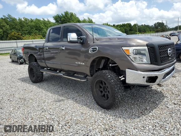 2017 Nissan Titan SL z VIN 1N6BA1F27HN547900, wystawiony jako Copart lot #61768145 z przebiegiem 148 383 mil mil oraz Szkoda całkowita • Salvage title. Historia ofert i sprzedaży dostępna na DreamBid. Obrazek 4.