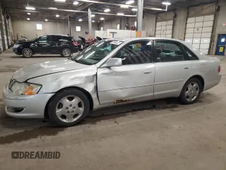 2003 Toyota Avalon XL z VIN 4T1BF28B73U304900, wystawiony jako Copart lot #57500225 z przebiegiem 180 088 mil mil oraz Szkoda całkowita • Salvage title. Historia ofert i sprzedaży dostępna na DreamBid. Obrazek 1.