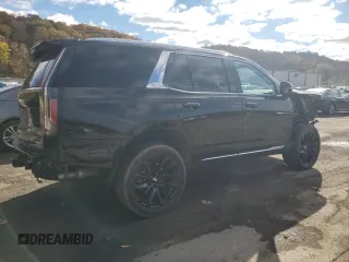 2024 Cadillac Escalade 4WD Premium Luxury with VIN 1GYS4BKL1RR181502, listed as a Copart auction lot 77155704 with 6,588 mi miles and Salvage title. Bid and sale history available at DreamBid. Image 3.
