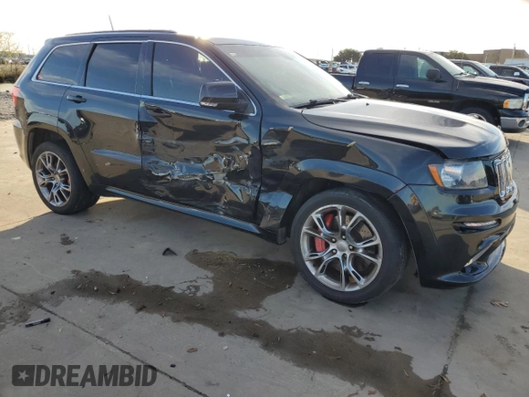 2012 Jeep Grand Cherokee SRT8 with VIN 1C4RJFDJ9CC346867, listed as a Copart auction lot 86349154 with 125,130 mi miles and Salvage Title. Bid and sale history available at carsss.com. Image 4.