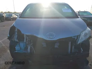 2014 Toyota Sienna LE AAS with VIN 5TDKK3DC1ES520561, listed as a IAAI auction lot 41959565 with 115,908 mi miles and . Bid and sale history available at carsss.com. Image 6.