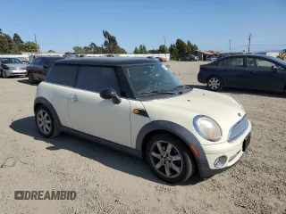 2010 MINI Hardtop with VIN WMWMF3C5XATZ66863, listed as a Copart auction lot 55695585 with 59,294 mi miles and Clean Title. Bid and sale history available at DreamBid. Image 4.