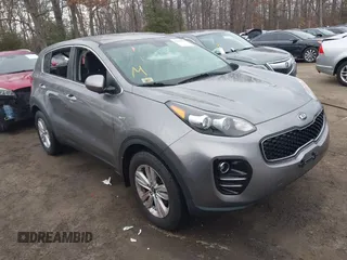 2018 Kia Sportage LX with VIN KNDPMCAC7J7393243, listed as a IAAI auction lot 41484579 with 122,022 mi miles. Bid and sale history available at carsss.com. Image 1.