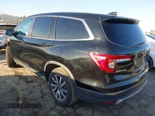 2021 Honda Pilot EX-L with VIN 5FNYF5H51MB004516, listed as a IAAI auction lot 41759992 with 75,476 mi miles. Bid and sale history available at carsss.com. Image 3.