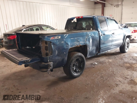 2016 Chevrolet Silverado 1500 LT with VIN 1GCVKREC5GZ296369, listed as a IAAI auction lot 41262302 with 122,859 mi miles. Bid and sale history available at carsss.com. Image 4.