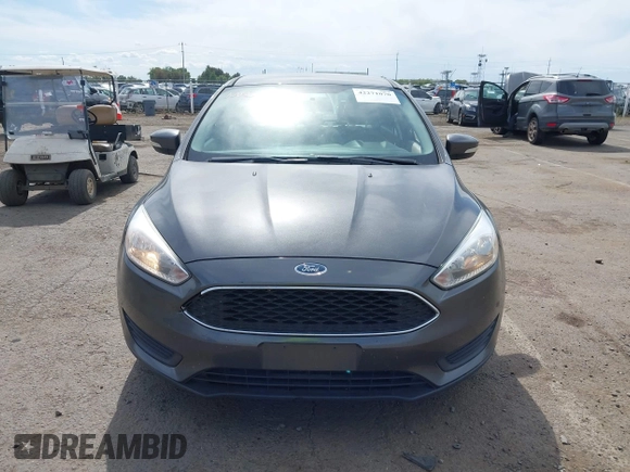 2018 Ford Focus SE z VIN 1FADP3F20JL327186, wystawiony jako IAAI lot #42271070 z przebiegiem 131 511 mil mil oraz . Historia ofert i sprzedaży dostępna na DreamBid. Obrazek 12.