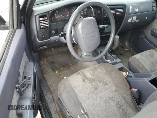 1999 Toyota Tacoma PreRunner z VIN 4TASM92N5XZ417982, wystawiony jako Copart lot #85216054 z przebiegiem 200 772 mil mil oraz Szkoda całkowita • Salvage title. Historia ofert i sprzedaży dostępna na DreamBid. Obrazek 8.