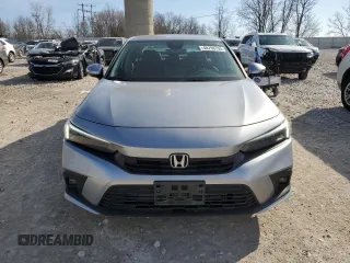 2023 Honda Civic Touring z VIN 2HGFE1F97PH323539, wystawiony jako Copart lot #48790795 z przebiegiem 24 049 mil mil oraz Szkoda całkowita • Salvage title. Historia ofert i sprzedaży dostępna na DreamBid. Obrazek 5.