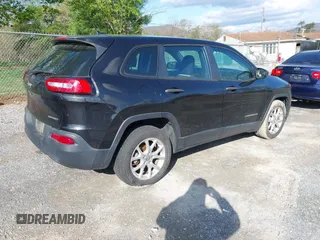 2014 Jeep Cherokee Sport with VIN 1C4PJLAB4EW110051, listed as a IAAI auction lot 41961698 with 153,570 mi miles and . Bid and sale history available at DreamBid. Image 4.