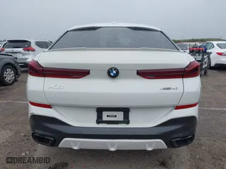2021 BMW X6 xDrive40i with VIN 5UXCY6C00M9F88215, listed as a IAAI auction lot 41646498 with 43,587 mi miles. Bid and sale history available at carsss.com. Image 16.