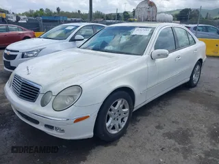 2003 Mercedes-Benz E-Class 3.2L with VIN WDBUF65J23A120318, listed as a IAAI auction lot 41927993 with 113,578 mi miles. Bid and sale history available at carsss.com. Image 18.