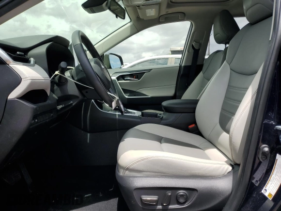 2023 Toyota RAV4 Hybrid XLE Premium z VIN JTMB6RFV1PD100836, wystawiony jako Copart lot #51694985 z przebiegiem 19 870 mil mil oraz Szkoda całkowita • Salvage title. Historia ofert i sprzedaży dostępna na DreamBid. Obrazek 7.