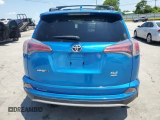 2016 Toyota RAV4 XLE with VIN JTMRFREV2GJ058808, listed as a Copart auction lot 61449135 with 73,985 mi miles and Salvage title. Bid and sale history available at DreamBid. Image 6.