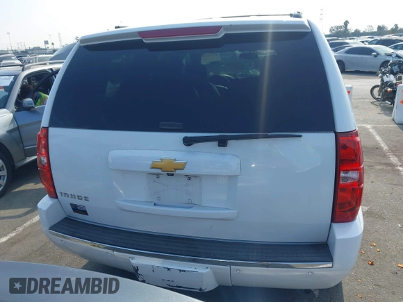 2013 Chevrolet Tahoe LTZ with VIN 1GNSKCE04DR374682, listed as a IAAI auction lot 42779526 with 139,533 mi miles and . Bid and sale history available at DreamBid. Image 16.