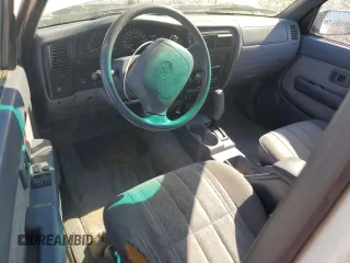 1999 Toyota Tacoma PreRunner with VIN 4TASM92N0XZ559544, listed as a Copart auction lot 86626024 with 209,794 mi miles and Salvage title. Bid and sale history available at DreamBid. Image 8.