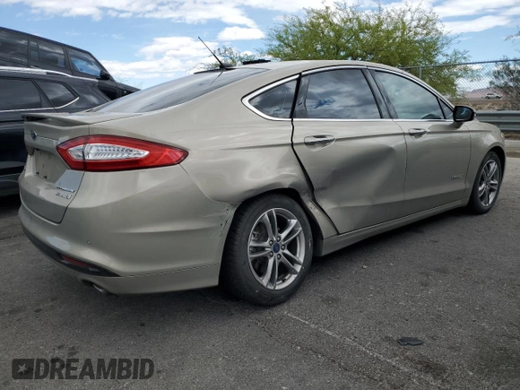 2015 Ford Fusion Titanium Hybrid with VIN 3FA6P0RUXFR115229, listed as a Copart auction lot 54629355 with 76,671 mi miles and Salvage title. Bid and sale history available at DreamBid. Image 3.