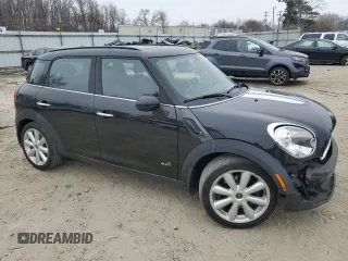 2011 MINI Countryman S with VIN WMWZC5C57BWL53271, listed as a Copart auction lot 48595315 with 107,716 mi miles and Clean Title. Bid and sale history available at DreamBid. Image 4.