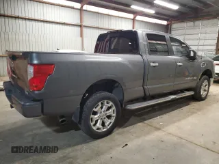 2016 Nissan Titan Platinum Reserve z VIN 1N6BA1F27GN517455, wystawiony jako Copart lot #51257125 z przebiegiem 156 675 mil mil oraz Czysty tytuł • Clean title. Historia ofert i sprzedaży dostępna na DreamBid. Obrazek 3.