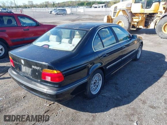2000 BMW 5 Series 528iA with VIN WBADM6348YGU11038, listed as a IAAI auction lot 41961847 with 195,493 mi miles. Bid and sale history available at carsss.com. Image 4.