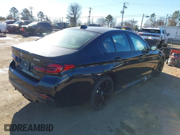 2023 BMW 5 Series 540i xDrive with VIN WBA73BJ02PWY04028, listed as a IAAI auction lot 41327638 with 7,610 mi miles and . Bid and sale history available at carsss.com. Image 4.
