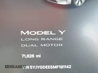 2021 Tesla Model Y Long Range with VIN 5YJYGDEE5MF191142, listed as a IAAI auction lot 41448514 with 71,626 mi miles. Bid and sale history available at carsss.com. Image 16.